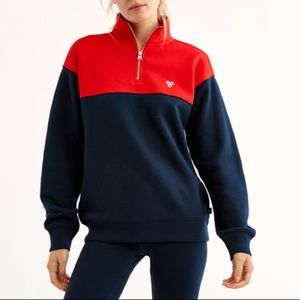 Red and navy quarter zip sweatshirt